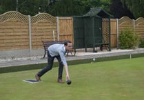 Ellis tries... Bowling