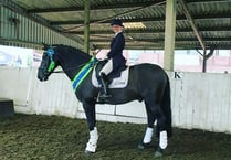 First place at British Dressage Area Festival for Alice and Des