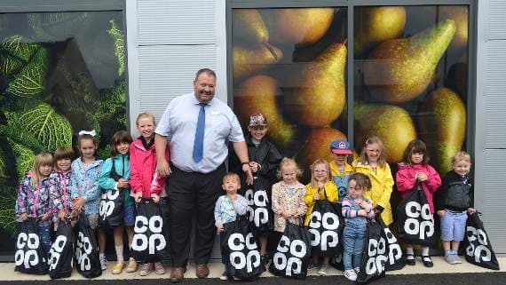 Spring Gate Nursery officially opens the new Co-op store | rossgazette.com