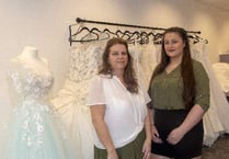 Wedding dress shop returns after arson attack