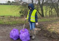 Young student helps with Spring Clean