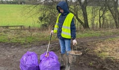 Young student helps with Spring Clean