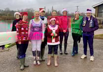 Rowers make a festive splash