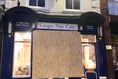 Window smash shatters the peace in town cafe