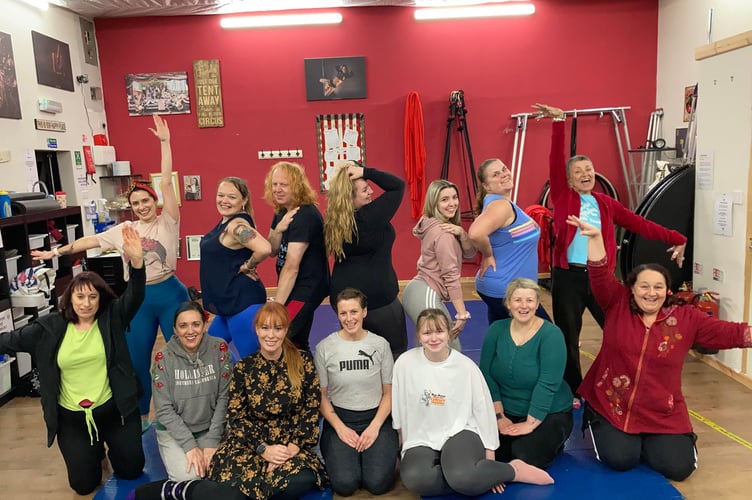 Students from Mizz Twisted Cherry Studios posing in a group photo.