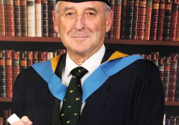 William Lyons with degree in 2017.