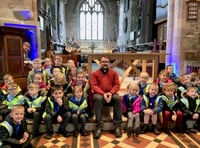 Youngsters try out vicar’s pulpit on church visit