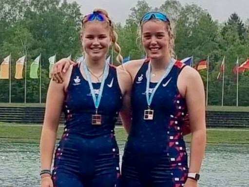 Ella Bardsley Taylor, left, with Megan Knight after winning bronze in Munich