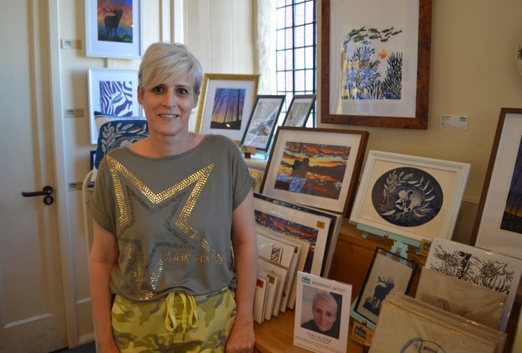 Tara Slater with her works at the Private View exhibition