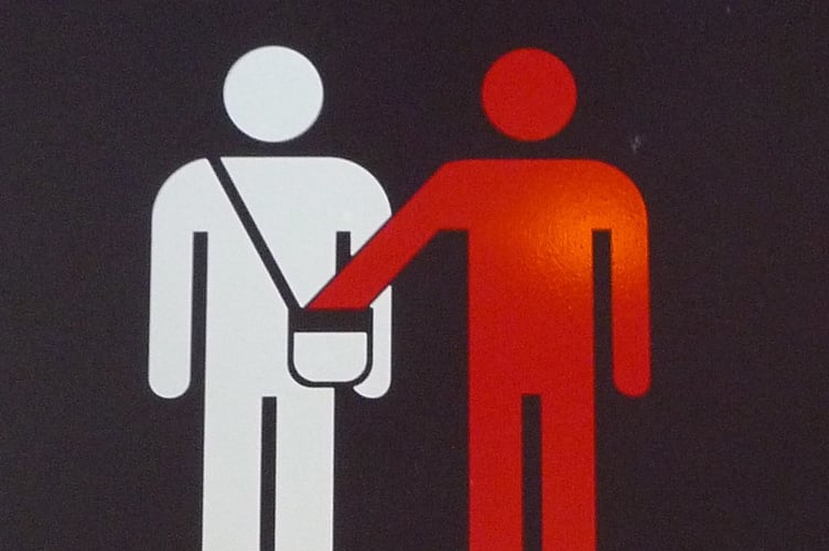 A sign of a person being pick-pocketed.