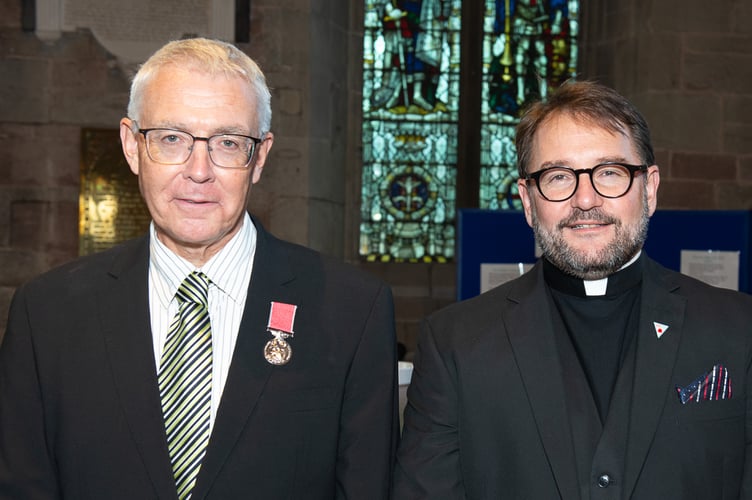 Mark Sanderson (left) with his BEM