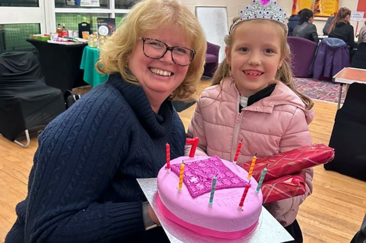 Diocese hub co-ordinator Lesley Grady celebrating with a young Ukrainian
