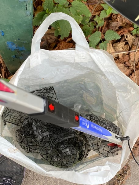 A bag full of singe-use plastic glove bags collected from the brook by Morrisons