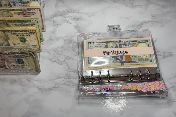 A still from a #CashStuffing TikTok video.
