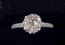 Diamond rings and medals on sale at Smiths auctions
