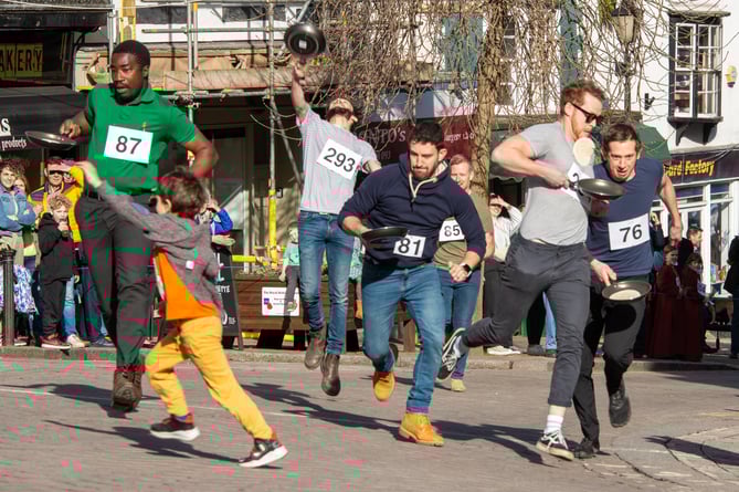 Pancake race, adults, Ross-on-Wye