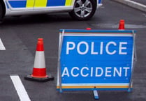 Man arrested after car found upside down beside Glewstone road