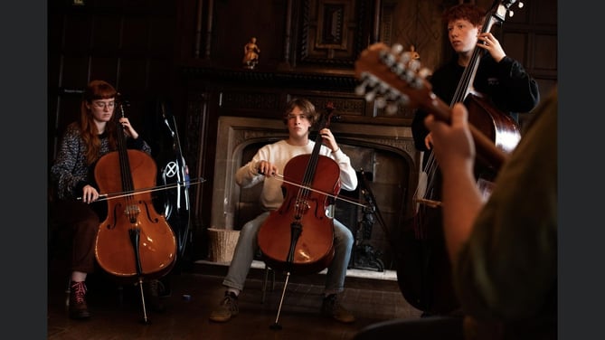 Alf Steward playing the cello