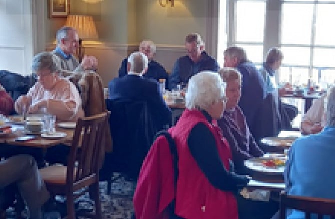Royal British Legion members enjoying a hearty breakfast