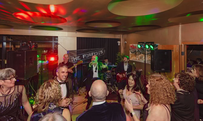 Mayor Ed and the Forfeits play a charity ball