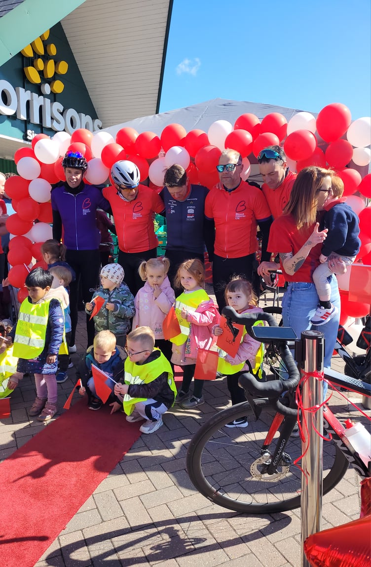 Cyclists taking a break at Ross Morrisons
