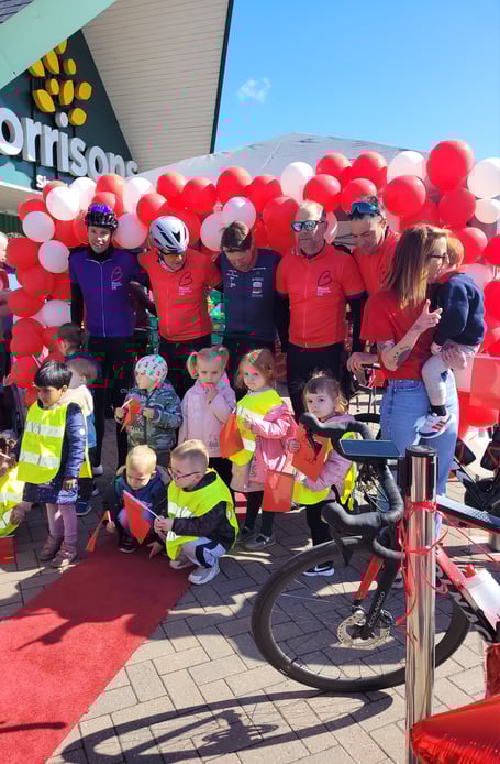 Cyclists taking a break at Ross Morrisons