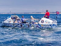 Freight train ocean seas batter Monmouthshire rowers' boat