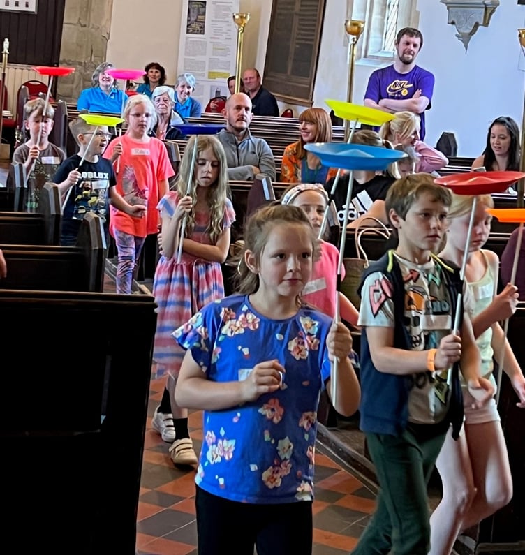 Walking down the isle spinning plates