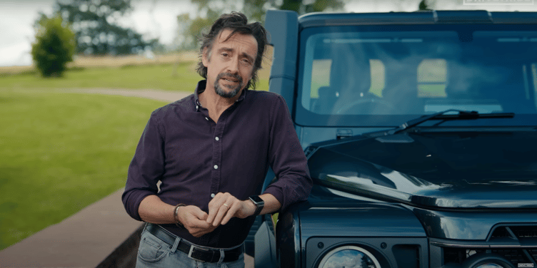 Richard Hammond leaning on a Land Rover