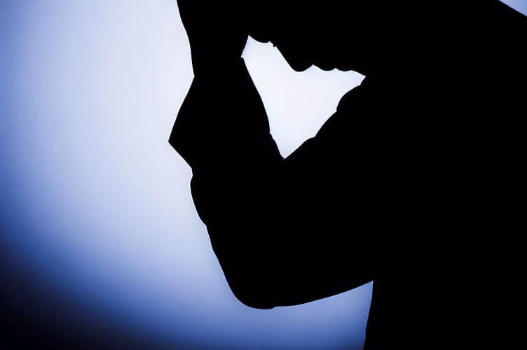Man with his head in his hands