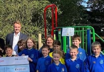 School 'so grateful' to village garage after playground donation