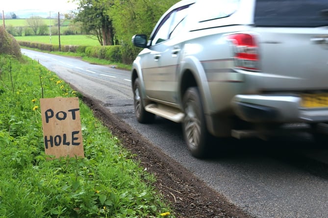 A pothole warning sign in Herefordshire