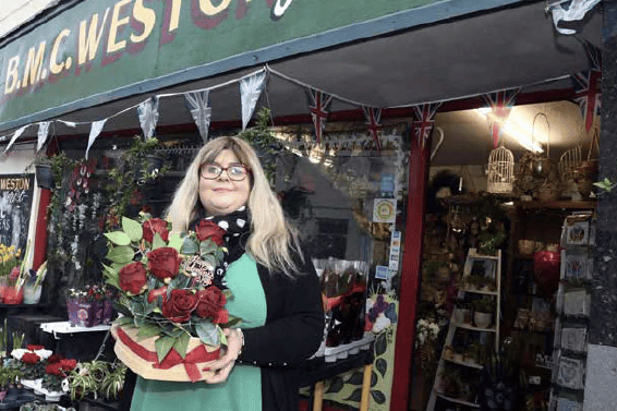 Claire Weston outside the shop her parents set up 35 years ago
