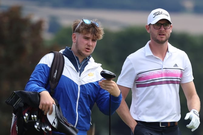 Leo Powell caddying for brother Niall