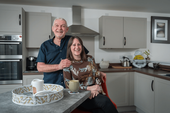 Mark Pizzie and Sally Pizzie in their new David Wilson home, Ross-on-Wye

