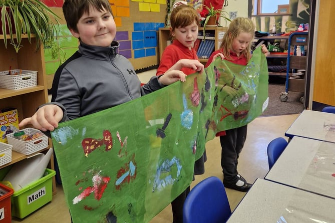 Children at Kymin View Primary School creating artwork for the Wye Valley River Festival