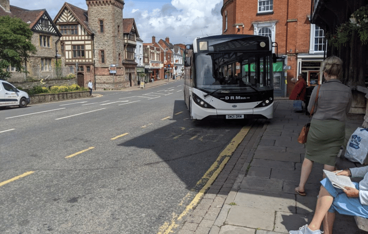 Passengers boarding the 232 bus at Cantilupe Road, Ross-on-Wye