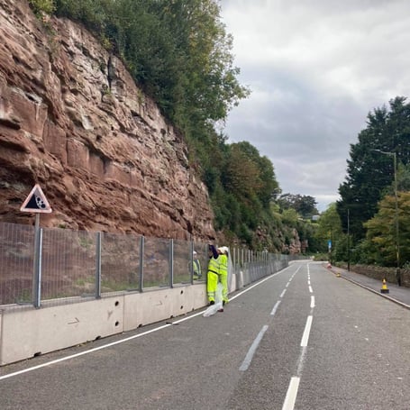 Highways officers inspect the safety measures after they were installed in 2021.