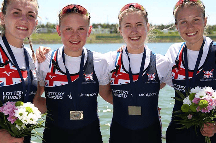 Mathilda, second from right, with her world medal boat in 2017
