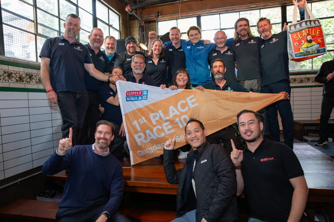 Eric Froggatt, back row far left, and the Ha Long Bay, Vietnam, crew celebrate victory in Seattle