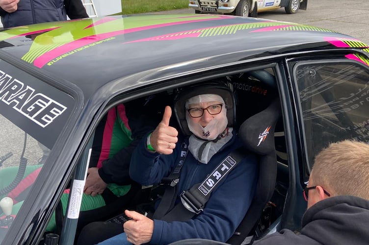 Sandra is all ready to go for a birthday ride in a rally car. Photos: PAUL WILLETTS
