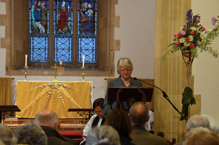 Parochial Church Council member Margaret Willis gives a reading from the Book of Chronicles.