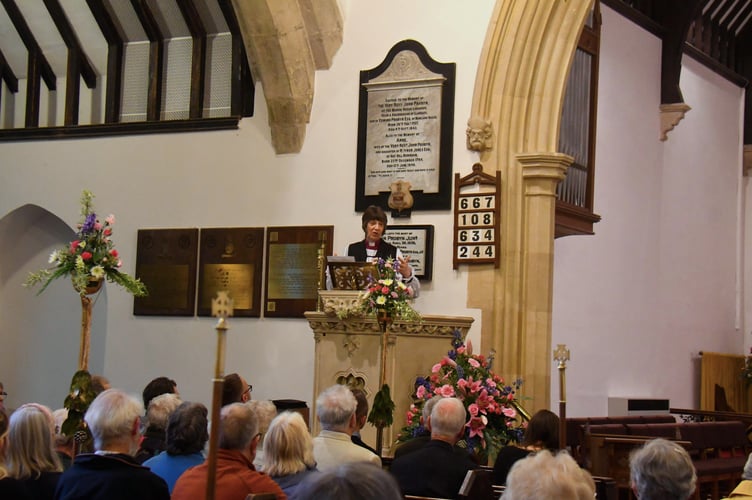 Bishop Rachel addresses the congregation.