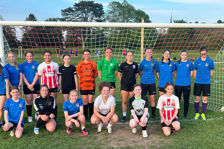 Mary McAteer, centre front, with Ross Juniors players