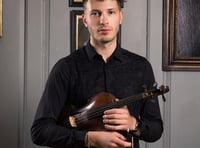 International violinist at music concert