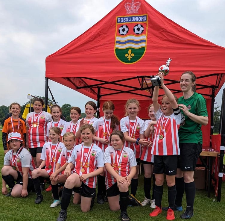 Kerys Harrop and the winning Ross Juniors U10 girls' team