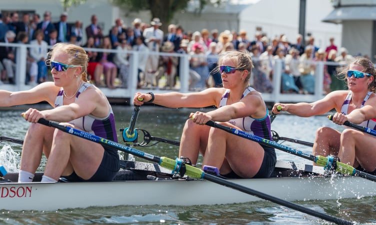 Violet Holbrow-Brooksbank centre drives for the line in her Wycliffe boat