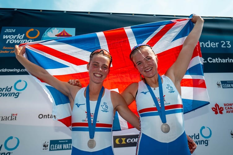 Violet Holbrow-Brooksbank, right, celebrates silver at the world U19 championships in Canada last year with double sculls partner Olivia Cheesmur. Photo: British Rowing