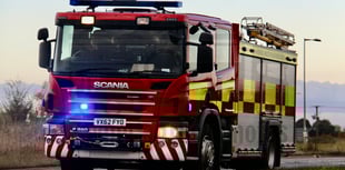 Firefighters tackle farm building blaze on outskirts of town