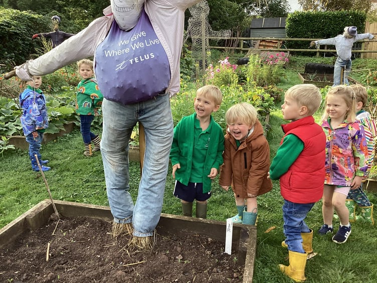 Children and scarecrows